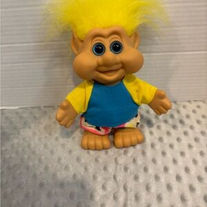 Vibrant Troll Doll with Yellow Hair and Blue Shirt